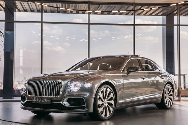  Flying Spur   6,0-  W12       ,     ,   .    635 ..,   900 ·.    0  100 /   3,8 ,     333 /.